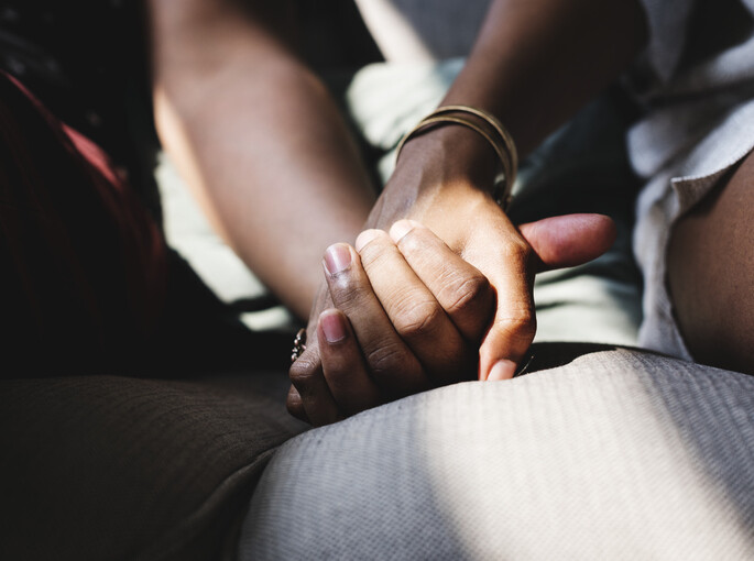 LA couple holding hands