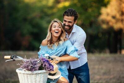 Young couple enjoying a day dating at the park