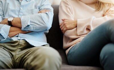 Cropped shot of a couple having a disagreement at home, toxic relationship