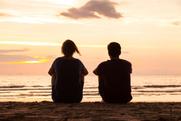 Los Angeles couple sitting by the beach