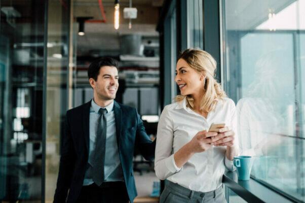 Two business people taking a break at work, female breadwinners
