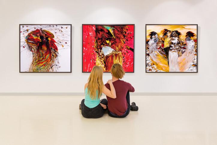 Young couple visits an art gallery