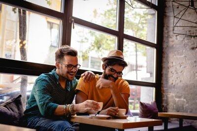 gay couple in a cafe on a first date