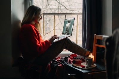 A woman using an online dating app