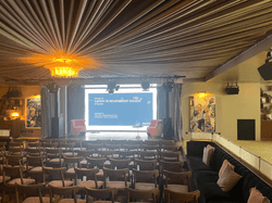 Stage and seating set up for a Maclynn talk on 5 Steps to Relationship Success