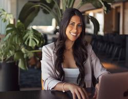 LA matchmaker sitting next to the computer